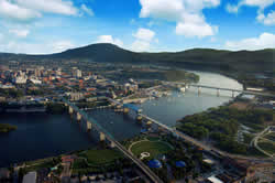 Aerial view of the Tennessee River, North Shore and Downtown Chattanooga, and Lookout Mountain in the background. 