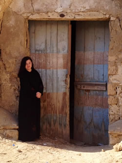 This is me (in my abaya) deep in the historical ruins in Yanbu, Saudi Arabia.