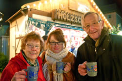 Enjoying the Christmas market with my grandparents