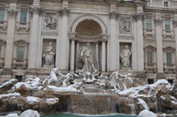 The Trevi Fountain under a rare blanket of snow