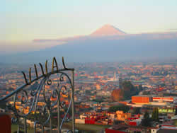 Sunrise view of the Popocatépetl volcano from atop the Cholula pyramid