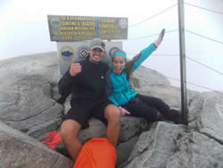 With my better 1/2 on the summit of the highest peak between the Himalayas and New Guinea. Such joy at the peak of Mt. Kinabalu where we climbed it in ONE day!