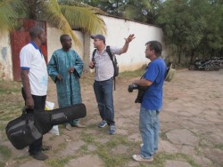 Jamey at a photo shoot with Malian musician Baba Salah.