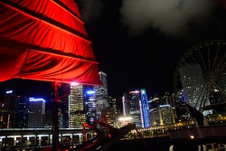 Hong Kong's skyline is one of the most beautiful in the world. The Aqualuna, red-sailed junk boat is a great way to see it.